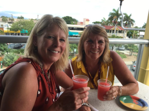 Two women enjoying cocktails on food tour in Sarasota, FL
