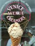 Ice cream cone photographed in front of the exterior window of Venice Creamery in FloridaVenice Creamery