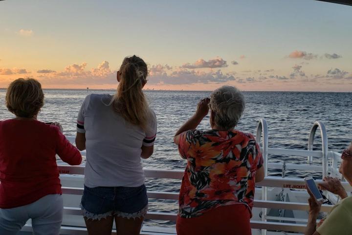a person standing in front of a body of water