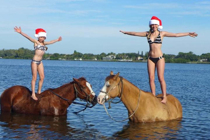 a person and a dog in a body of water