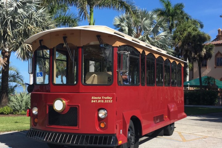 a bus that is sitting on the side of a road