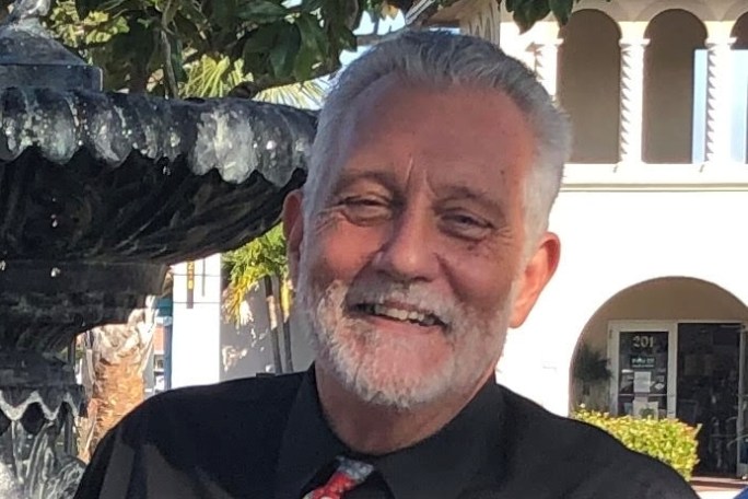 a man smiling for the camera