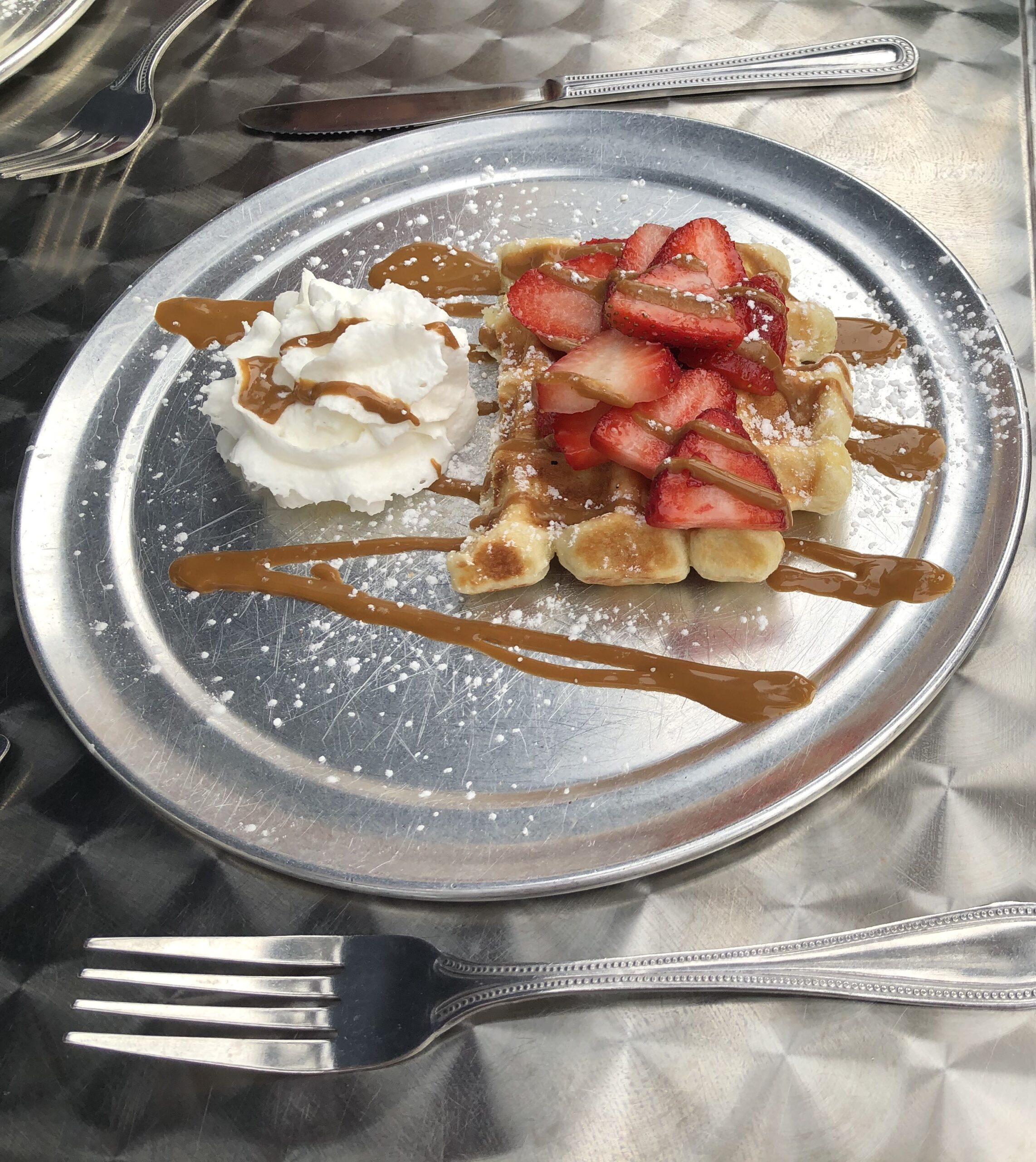 a plate of food with a fork and knife