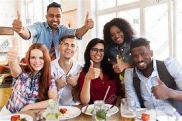 a group of people posing for the camera