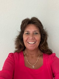 a person smiling for the camera